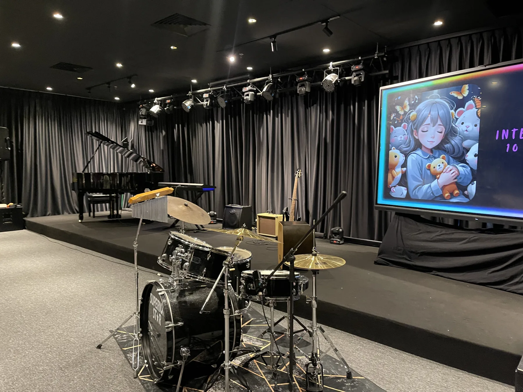 Live music stage and drum setup at Magic Dojo Event Hall
